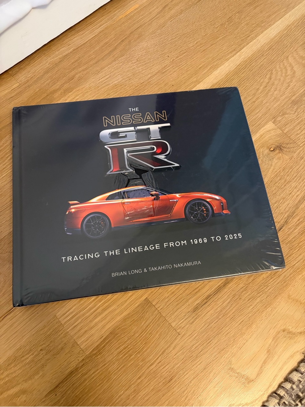 GT-R Orange Hardcover Book - Tracing the Lineage from 1969 to 2025
